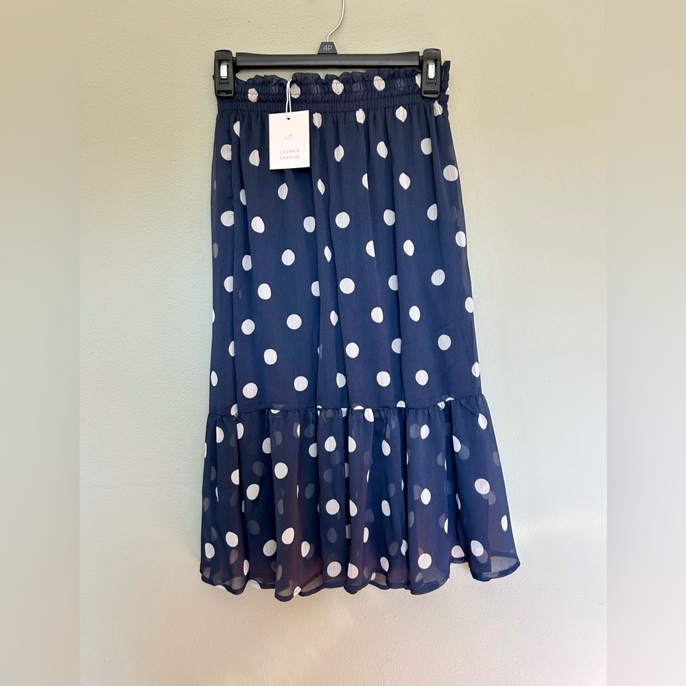 Navy w/ white polka dots skirt.